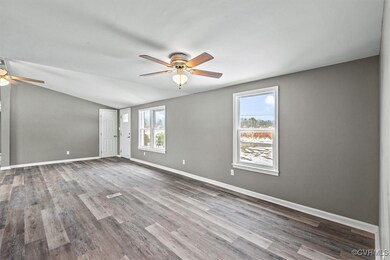 Unfurnished room with wood finished floors, ceilin