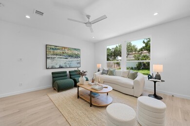 Living room featuring light wood-style flooring, 