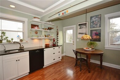 Another view of the naturally bright eat-in kitche
