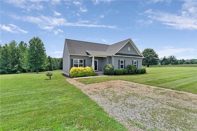 View of front of property featuring a front lawn