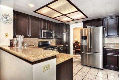 Freshly and professionally re-stained cabinetry,  