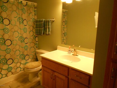 .full bath on main floor with linen area