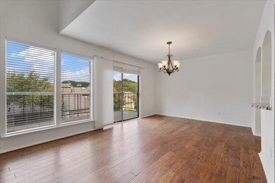 Unfurnished room with a chandelier, wood finished
