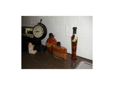 Beautiful granite countertops and subway tile in t