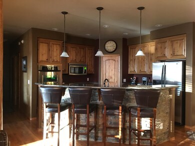 Kitchen and breakfast bar