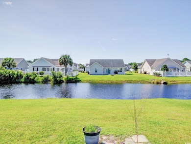Water view with nearby suburban area