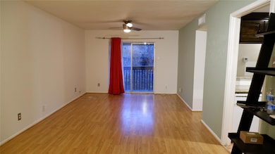 Living/dining combo room with ceiling fan and ligh