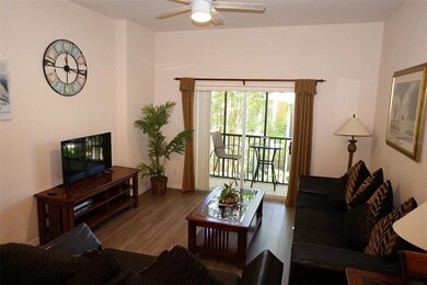 Living room with balcony and garden view
