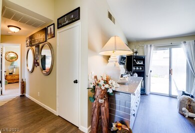 Hall leading to secondary bathroom and both bedroo