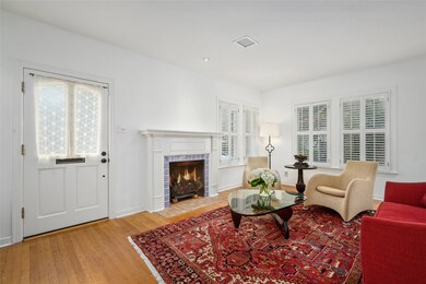 Formal living room with beautiful hardwood floors,