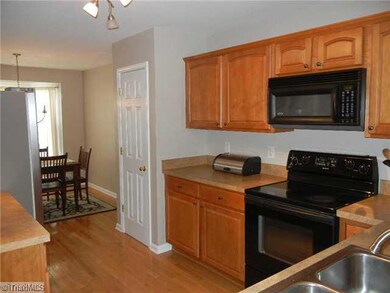 Kitchen. Seller installed new track lighting and kitchen faucet