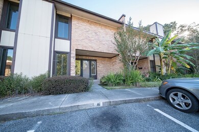 Two labeled parking places and one free space come