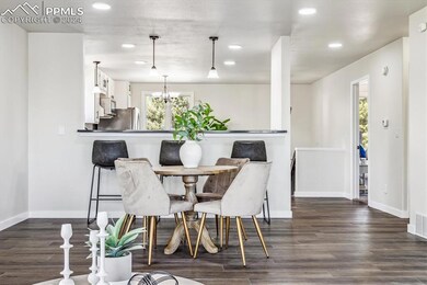 Dining room with a healthy amount of sunlight, dar