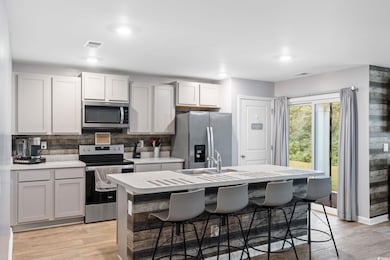 Kitchen with a kitchen breakfast bar, a kitchen is