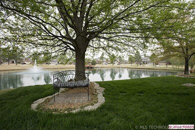 Stepping stones lead to a quaint sitting area bene