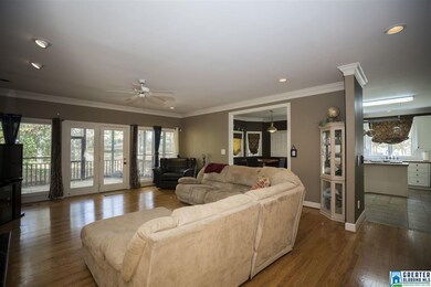 Very spacious great room with hardwood flooring an