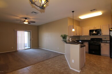 Kitchen to Great room 8415 N Coyote View