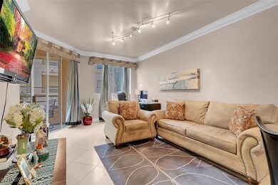 Living room featuring tile patterned flooring, cro