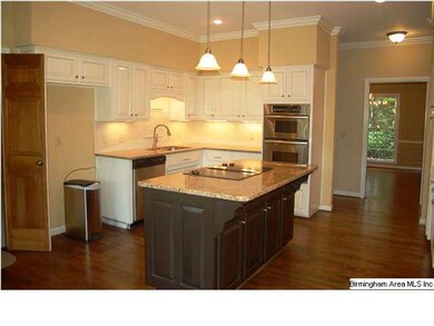 Kitchen has granite counter tops, stainless conven