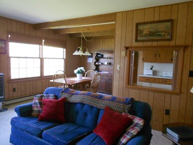 view from livingroom into kitchen/dining