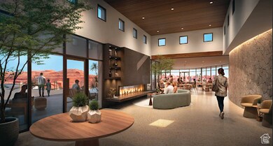 Lobby featuring a towering ceiling, wooden ceiling, recessed lighting, and a mountain view