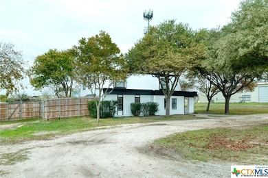 Front and left side of Main Building with perimete