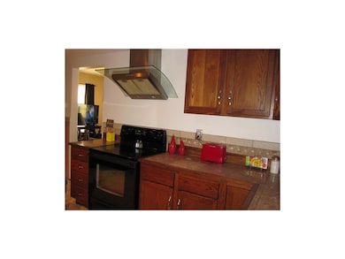 Here's part of the huge kitchen with smooth top st