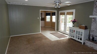 Large living room with beautiful french doors.