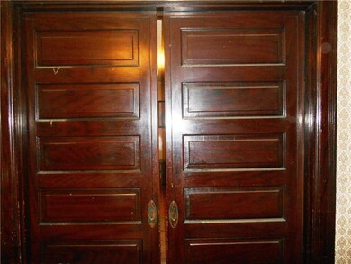 Original pocket doors on main level.
