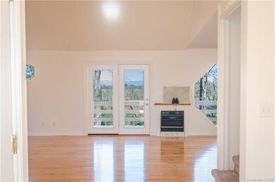 Front hallway opens up into the main living area t