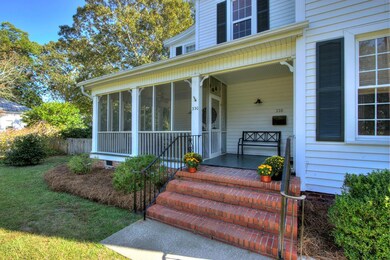 Front porch offers two entrances