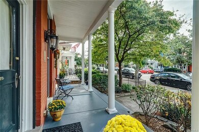 Covered front porch and bluestone patio.