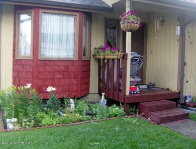 9610 New Haven front door flowers