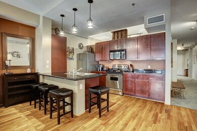 Gleaming oak hardwood floors in living/dining/kitc