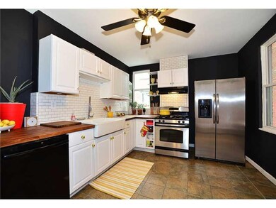 Kitchen. FARMHOUSE SINK AND CERAMIC TILE FLOORS AR