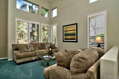 Formal living room with elegant wood plantation sh