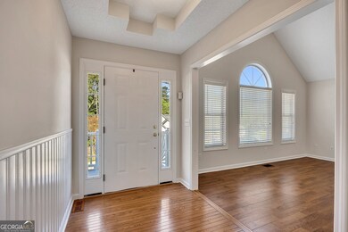 View of entry way and living room.