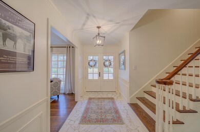 Stairs lead to expandable attic.