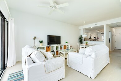 Living room view to dining & kitchen areas.
