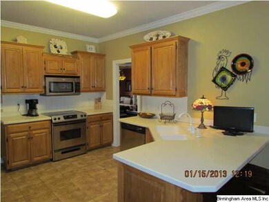 Spacious kitchen the offers solid surface countert