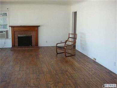 7102 Kermore Stanton CA Living room w/fireplace