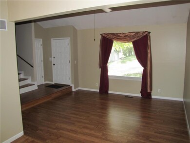 Formal living room has lots of natural light