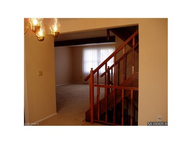 Looking from the dining room to the front of the l