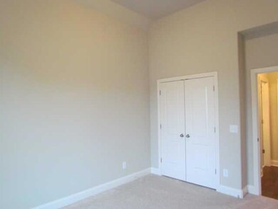 GUEST BEDROOM ON THE MAIN FLOOR.  THIS ROOM WOULD MAKE A GREAT FIRST FLOOR NURSERY.