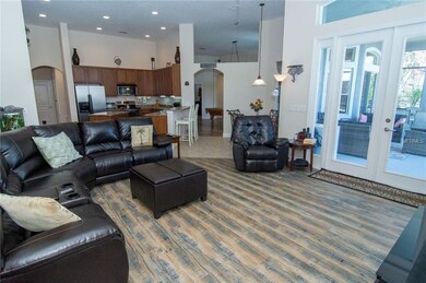 Kitchen opens to the family room leading out to th