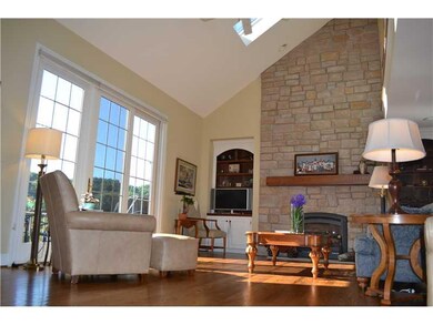 Living Room. Soaring 2 story living room with vaul