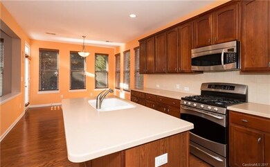 Kitchen with view of  Breakfast area and open to t