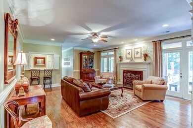 Double sets of French doors with transom windows a