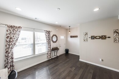 Entry Way with Storage Closet opens into this fabulous flex space ~ Office, Formal Dining Room, Relaxing Reading Room! 