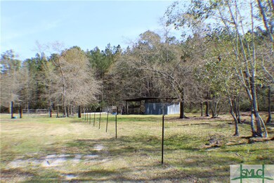 Pole barn fenced in separately for animals